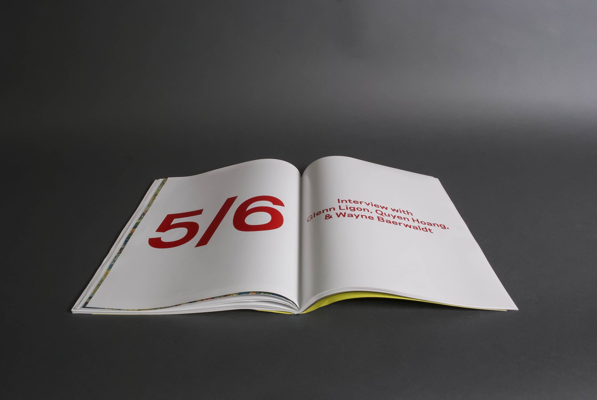 Printed book detail showing binding, paper stock, and edge treatment.