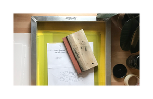 Screen printing frame and squeegee prepared for Rupi Kaur serigraph.